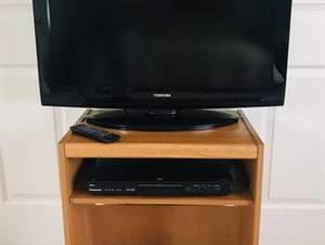 Toshiba TV and a TV stand